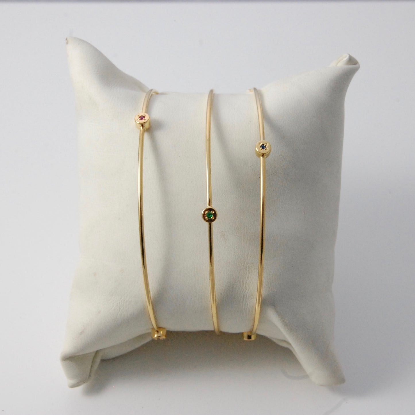 handmade gold bangle with sapphire, ruby or emerald studs