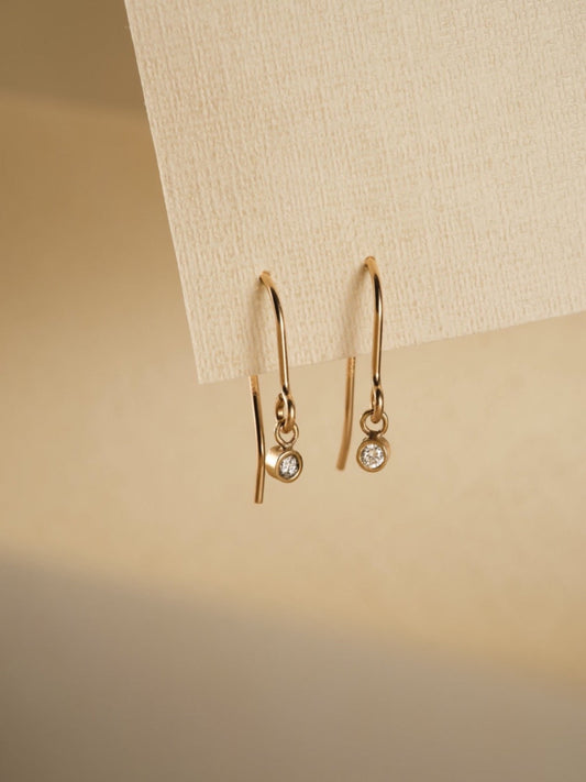 diamond and gold hook drop earrings