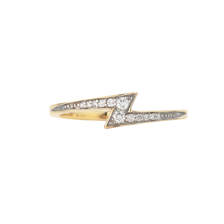 gold and white diamond lightning bolt ring white background