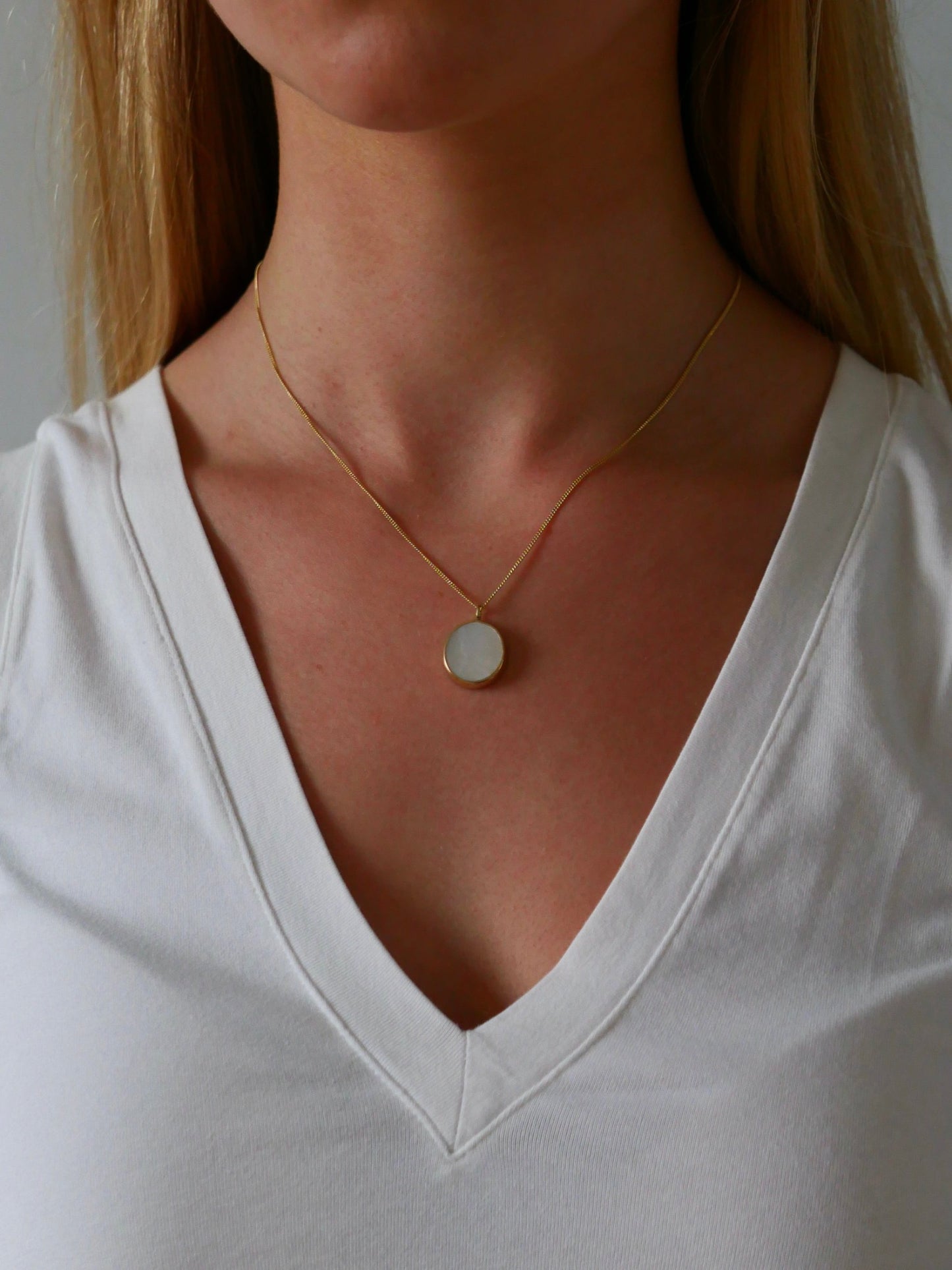 mother of pearl pendant necklace on model