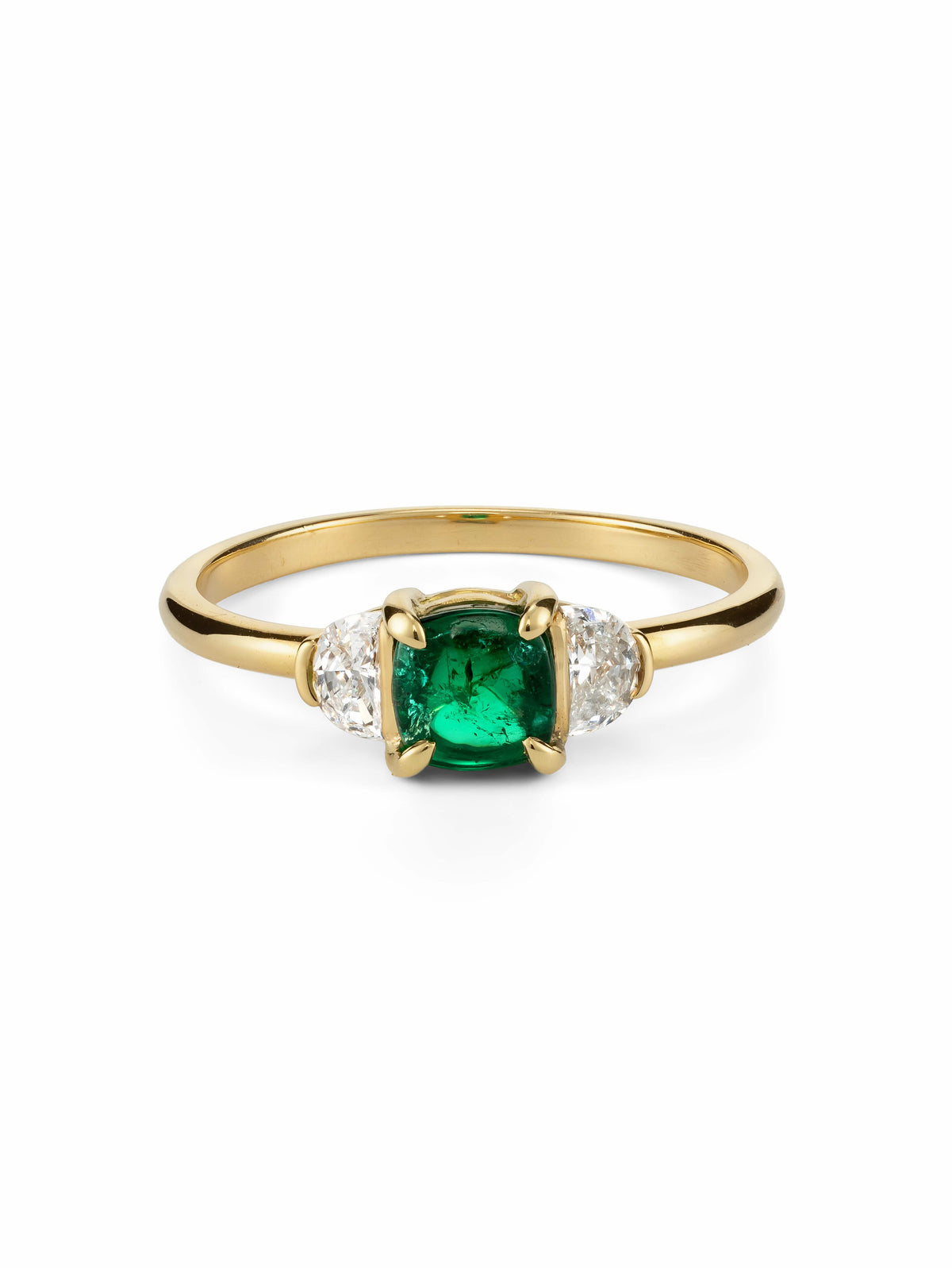 A yellow gold ring featuring a central cushion-cut green emerald gemstone, flanked by two half moon diamonds on a white background.