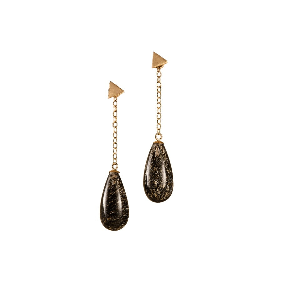 Pair of gold and black teardrop earrings on a white background