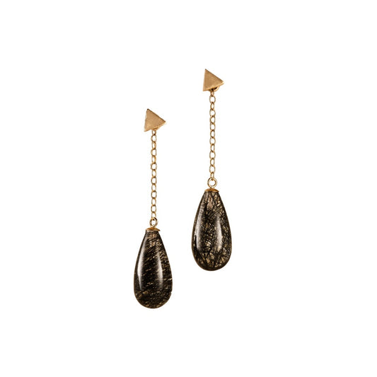 Pair of gold and black teardrop earrings on a white background