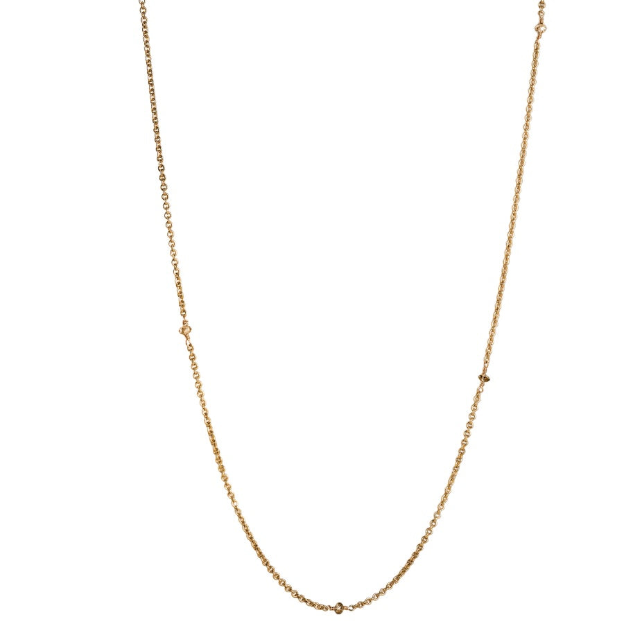 Gold chain necklace with diamond beads on a white background
