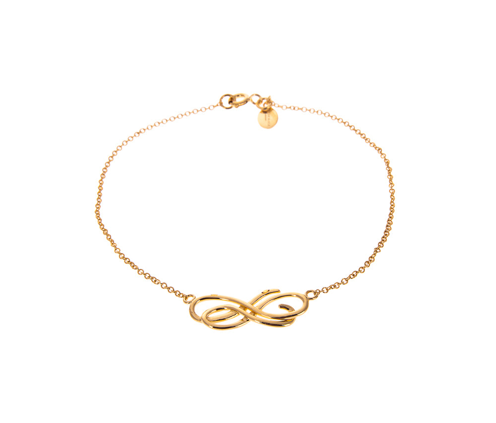 gold bracelet with gold love letter scroll design