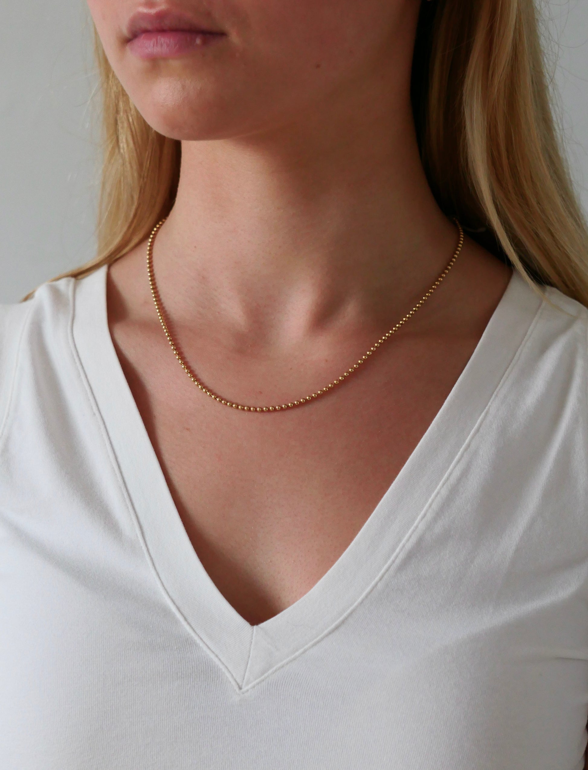 solid gold ball chain on model