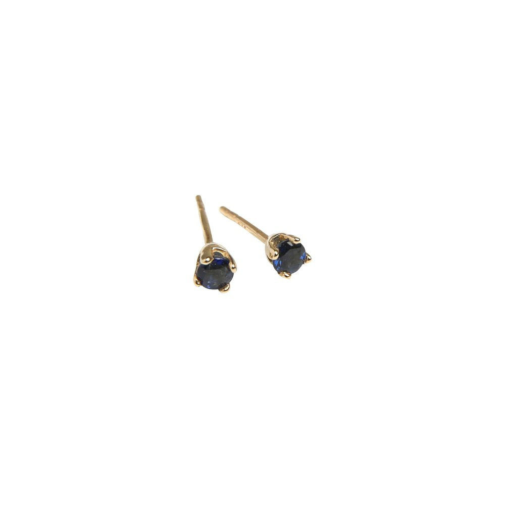blue sapphire earring studs on white background