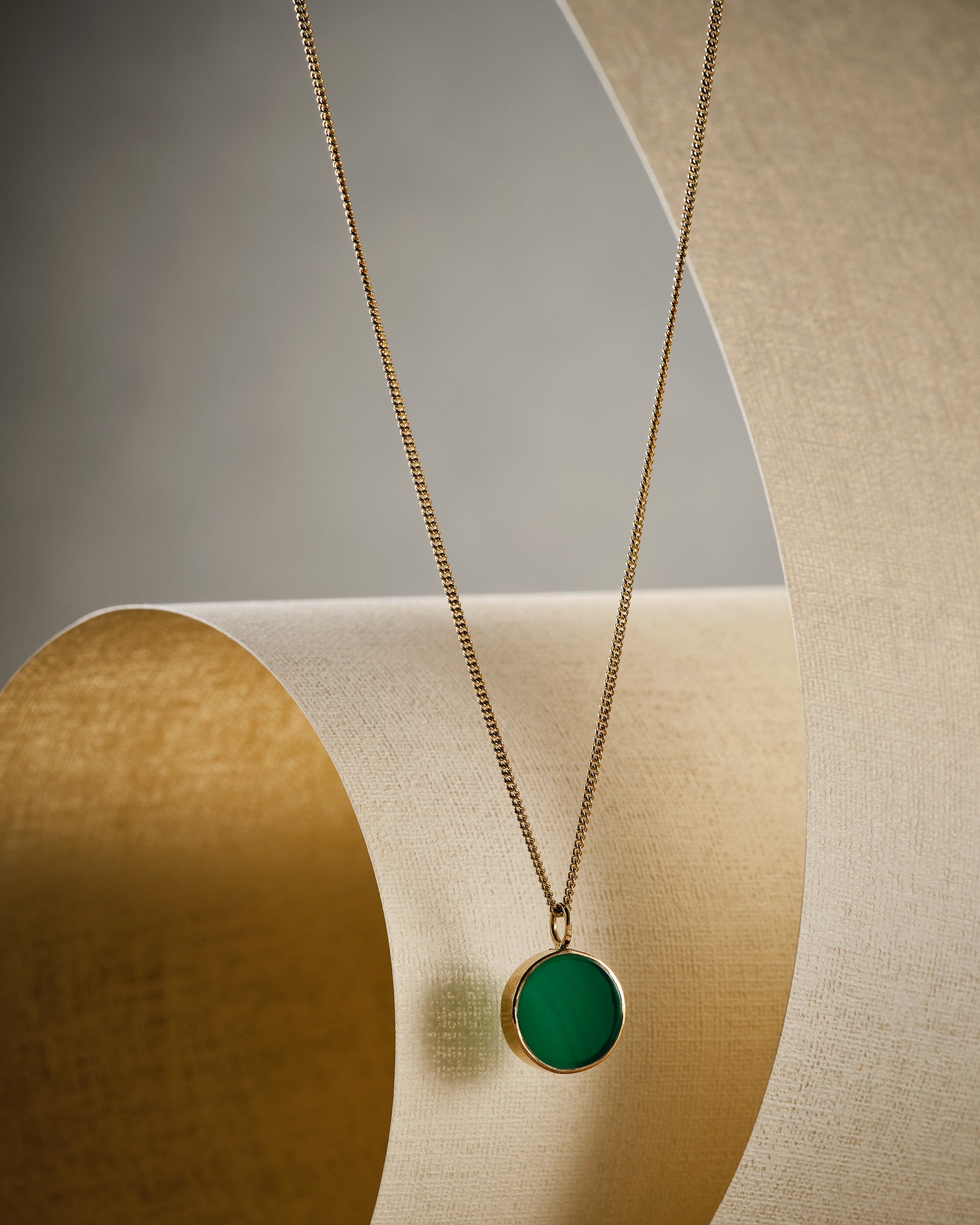 green agate disc and gold pendant necklace lifestyle